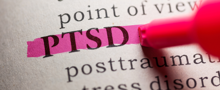 PTSD highlighted with a marker on a page