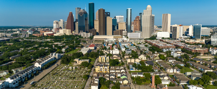 Skyline of Houston, TX with a cemetary in the front